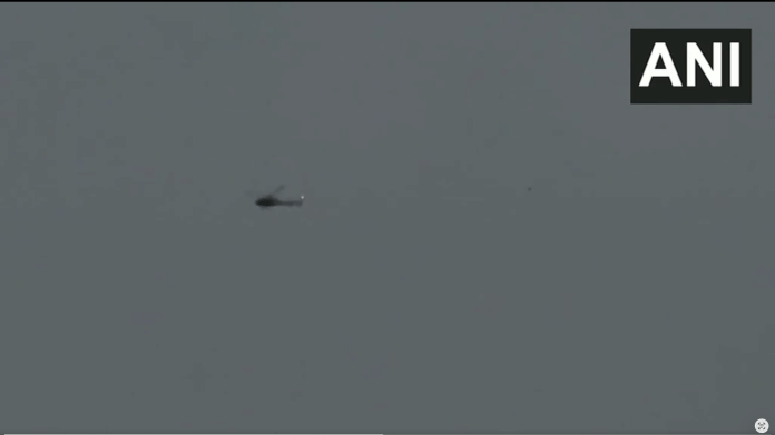A team from the district administration is currently searching for the missing helicopter travelling from Badrinath to Dehradun Friday, 30 October 2026. | Screengrab/ANI video